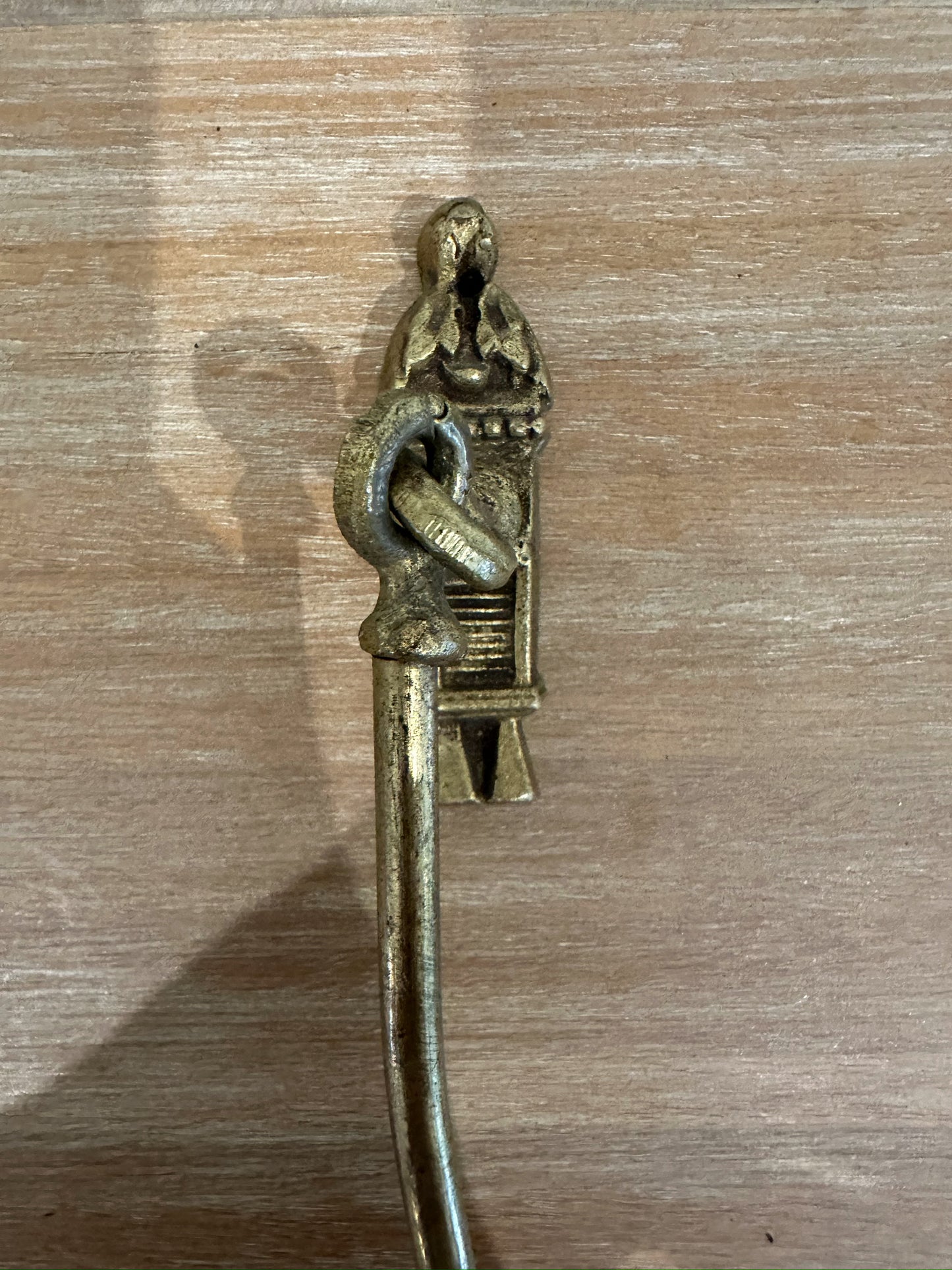 Pair of antique brass curtain tie-backs (Sold as a set)