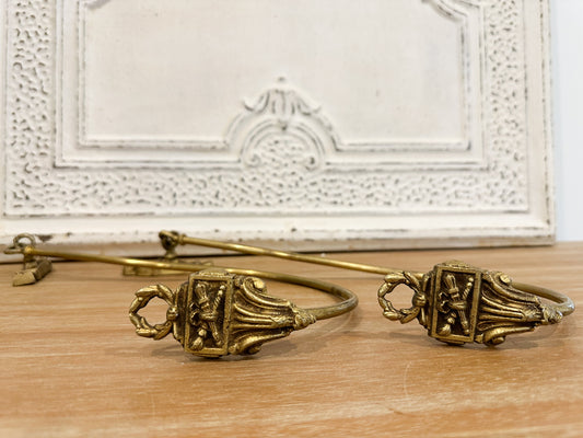 Pair of antique brass curtain tie-backs (Sold as a set)